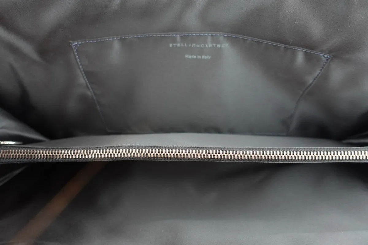 Green oversized zip around clutch RRP £525